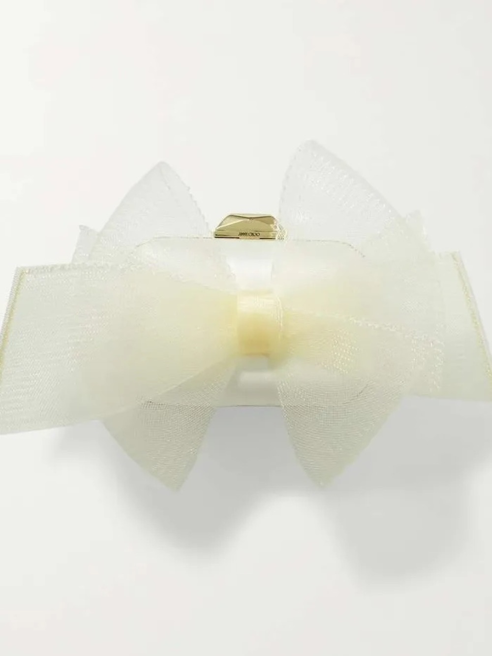 Jimmy choo-bow clutch

babara Palvin's wedding clutch